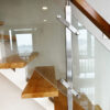 Stainless steel square pipe post on glass balcony railing glass clips